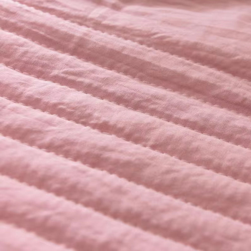 Plaid léger pour les nuits chaudes et les déplacements