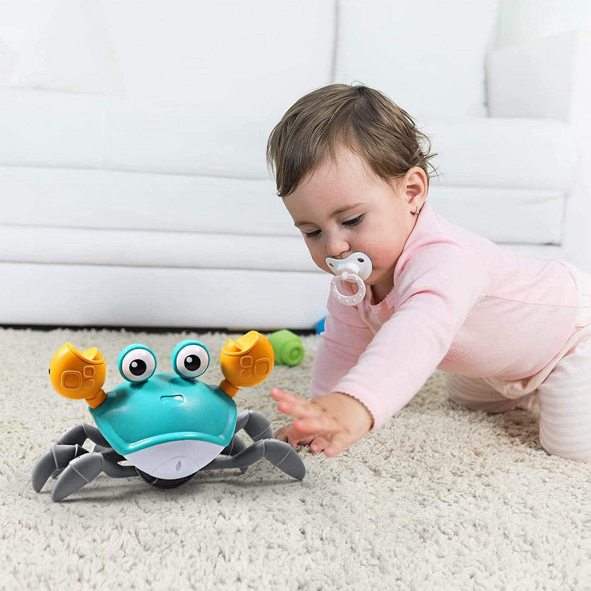 Crabe mobile lumineux et sonore pour bébé
