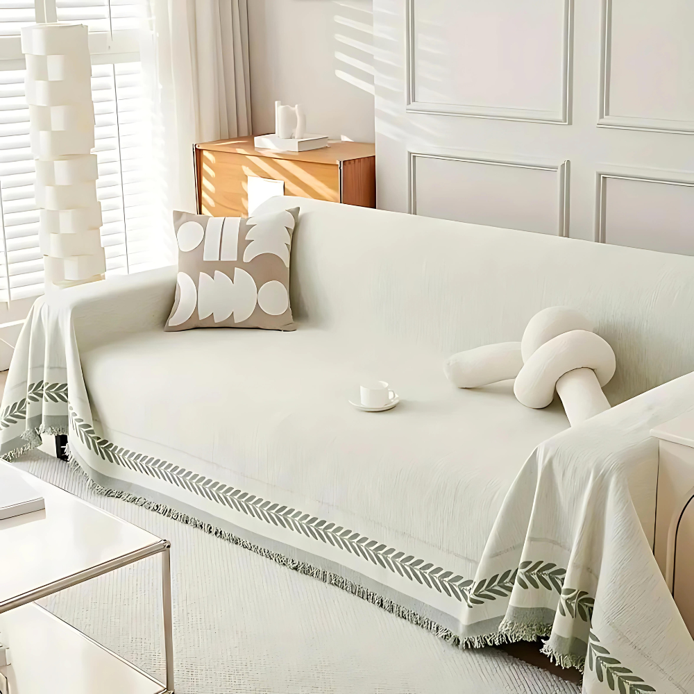 Jeté de canapé en jacquard avec pompons