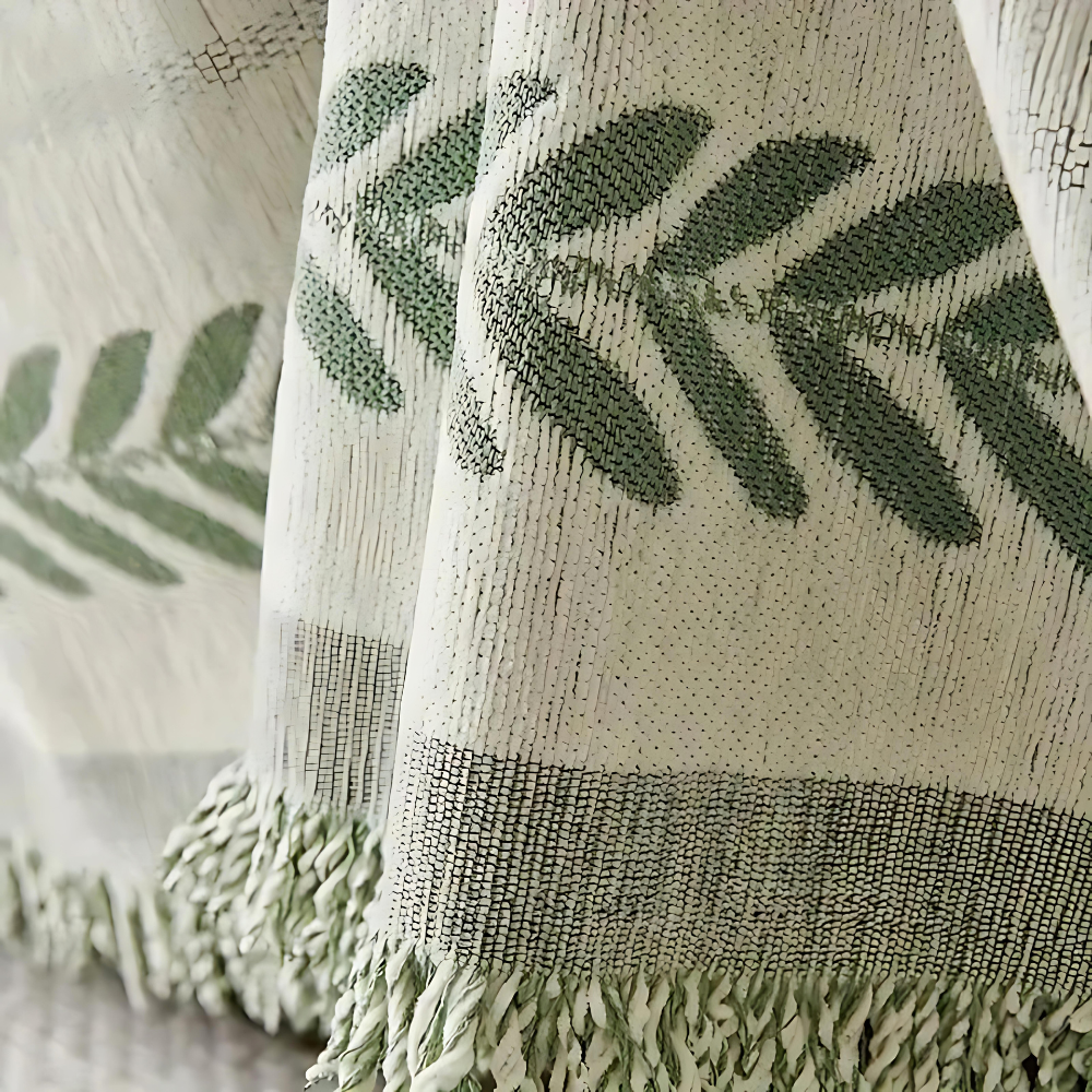 Jeté de canapé en jacquard avec pompons