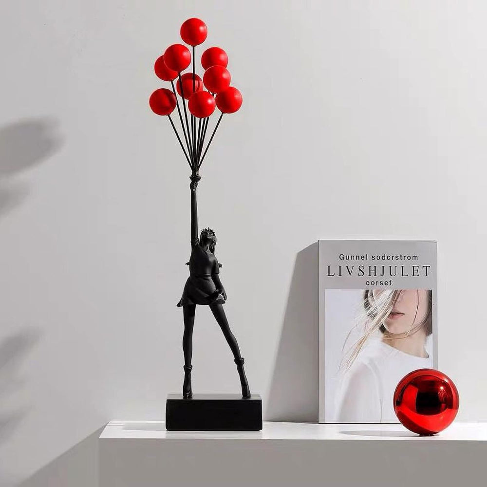 Sculpture décorative de jeune fille au ballon en résine