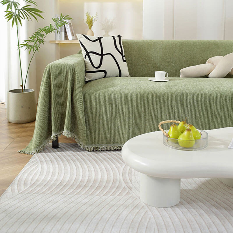 Jeté de canapé en chenille à chevrons et franges