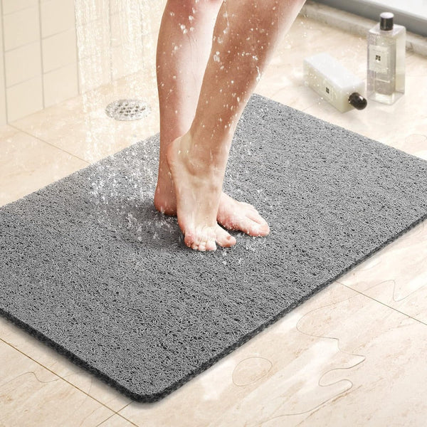 Tapis de douche antidérapant à structure drainante