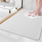 Tapis de douche antidérapant à structure drainante