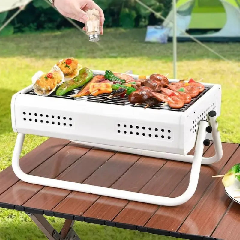 Barbecue à charbon portable avec poignées pliantes