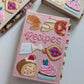 Carnet de recettes à couverture textile brodée