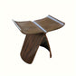 Tabouret à assise courbe en forme de papillon