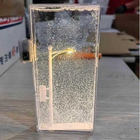 Lampe à effet de neige tombante