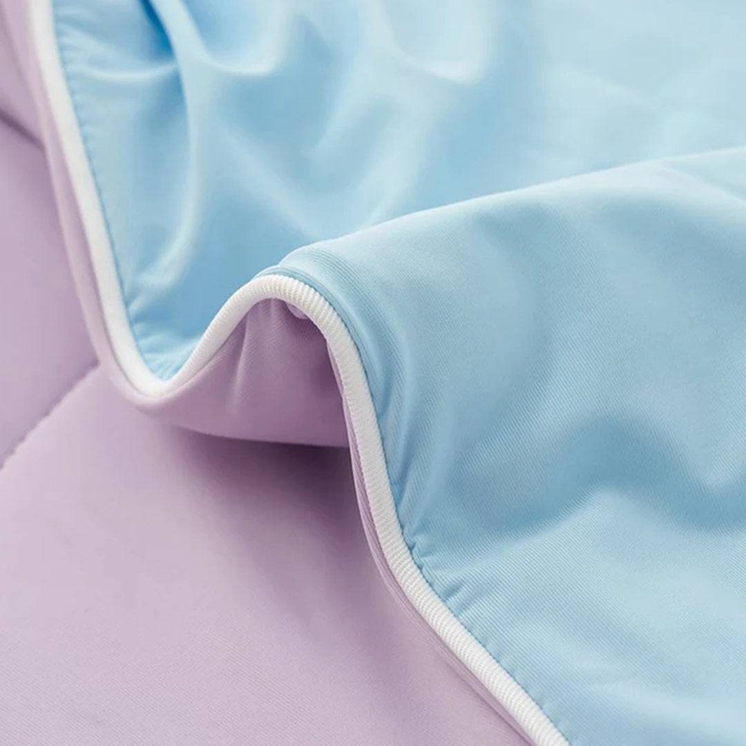 Couverture d'été réversible en nylon à garnissage polyester