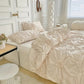 Housse de couette à plis et rosettes avec taies assorties
