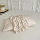 Housse de couette à plis et rosettes avec taies assorties