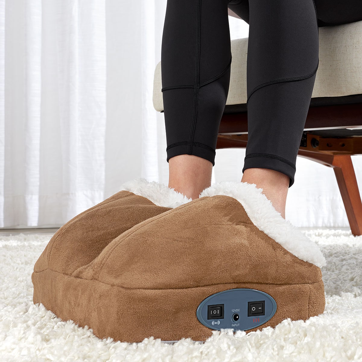 Chauffe-pieds électrique à deux poches et vibrations