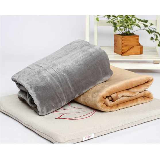 Plaid léger en polaire polyester à texture fausse fourrure