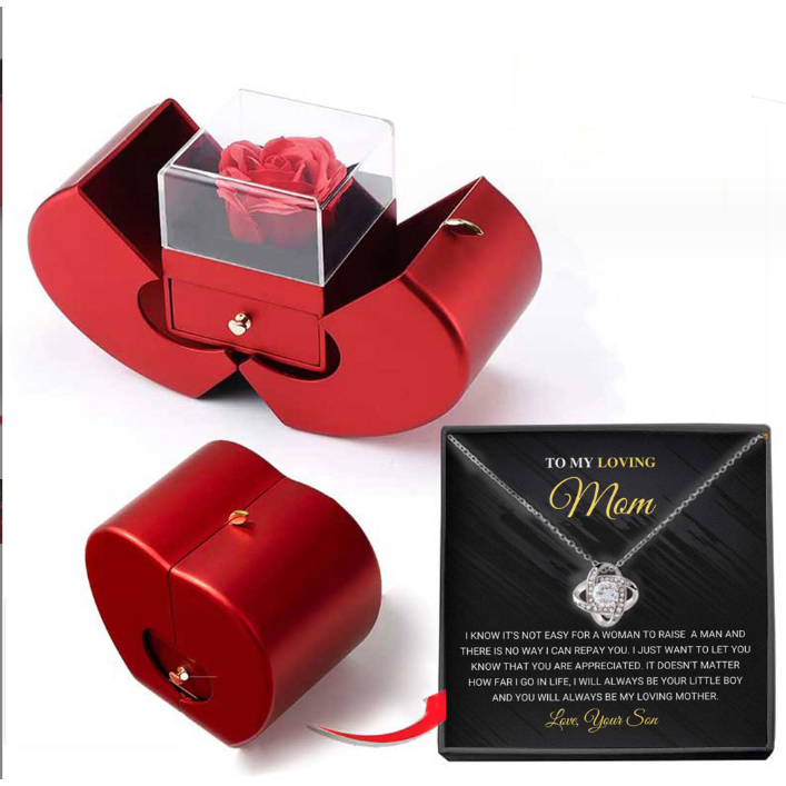 Coffret à bijoux en forme de pomme avec rose et collier