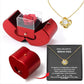 Coffret à bijoux en forme de pomme avec rose et collier