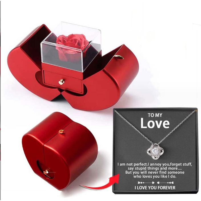 Coffret à bijoux en forme de pomme avec rose et collier