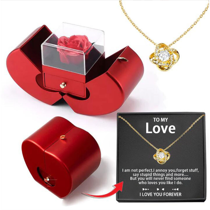 Coffret à bijoux en forme de pomme avec rose et collier