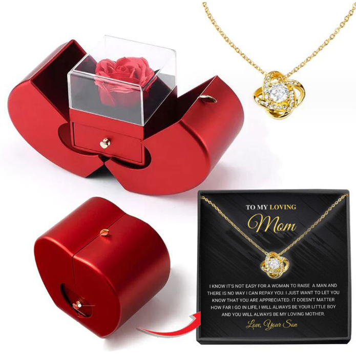 Coffret à bijoux en forme de pomme avec rose et collier