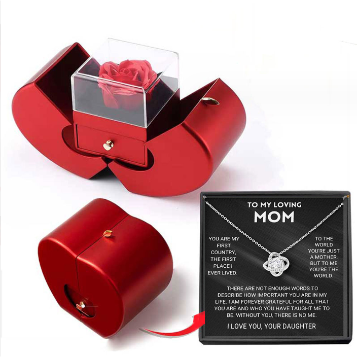 Coffret à bijoux en forme de pomme avec rose et collier