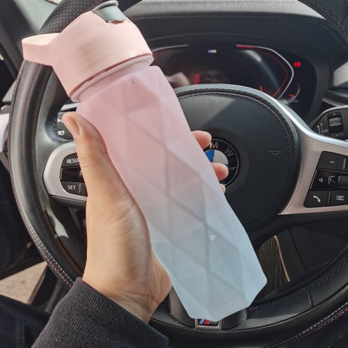 Gourde avec brumisateur à gâchette et anse de transport