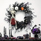 Couronne de porte d'Halloween à squelette et citrouilles