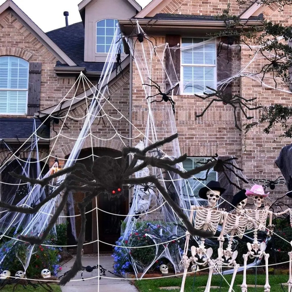 Toile d'araignée décorative avec grande araignée à pattes articulées