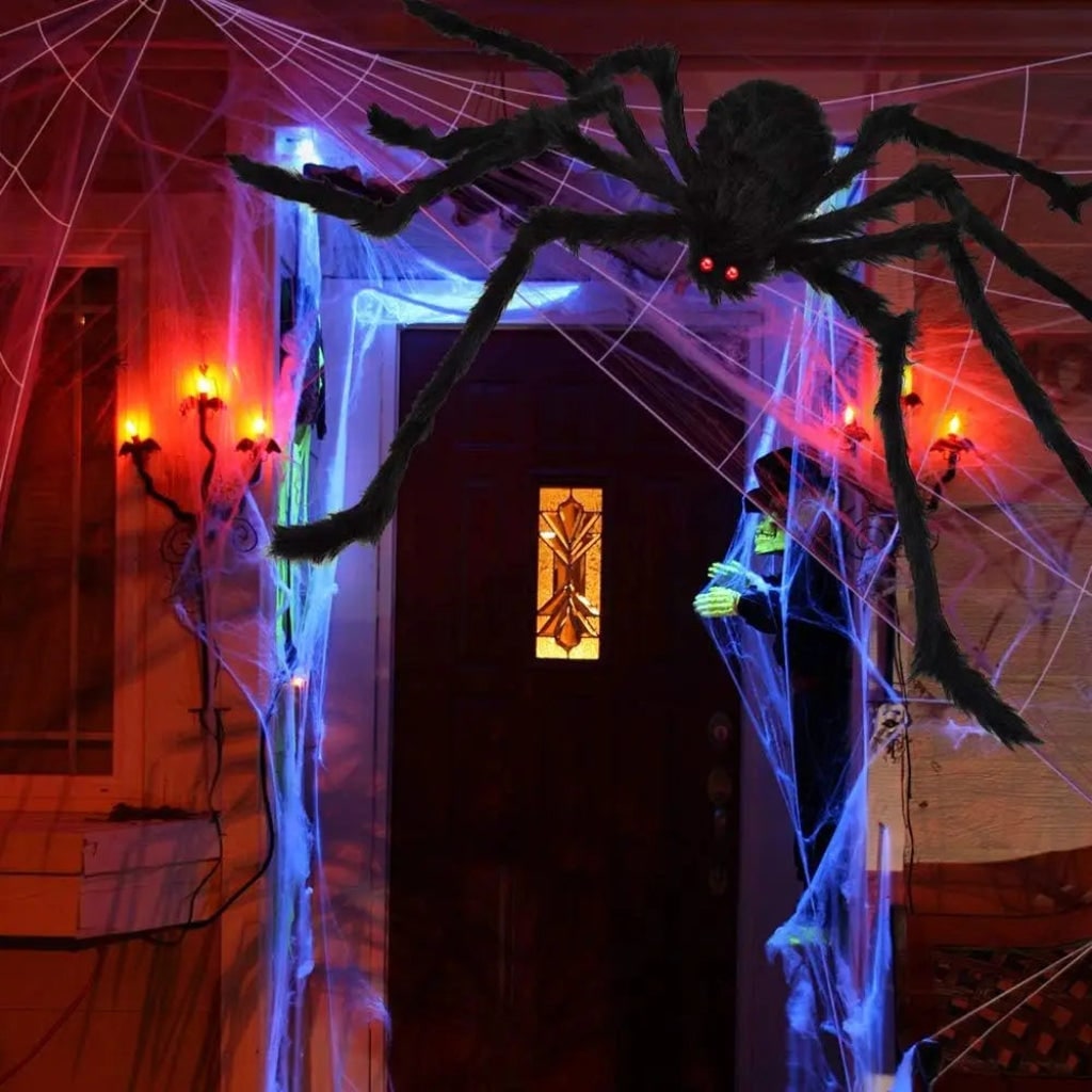 Toile d'araignée décorative avec grande araignée à pattes articulées