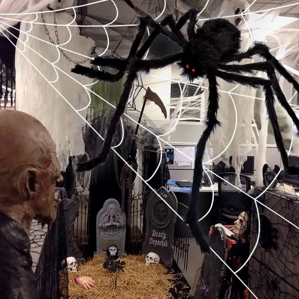 Toile d'araignée décorative avec grande araignée à pattes articulées