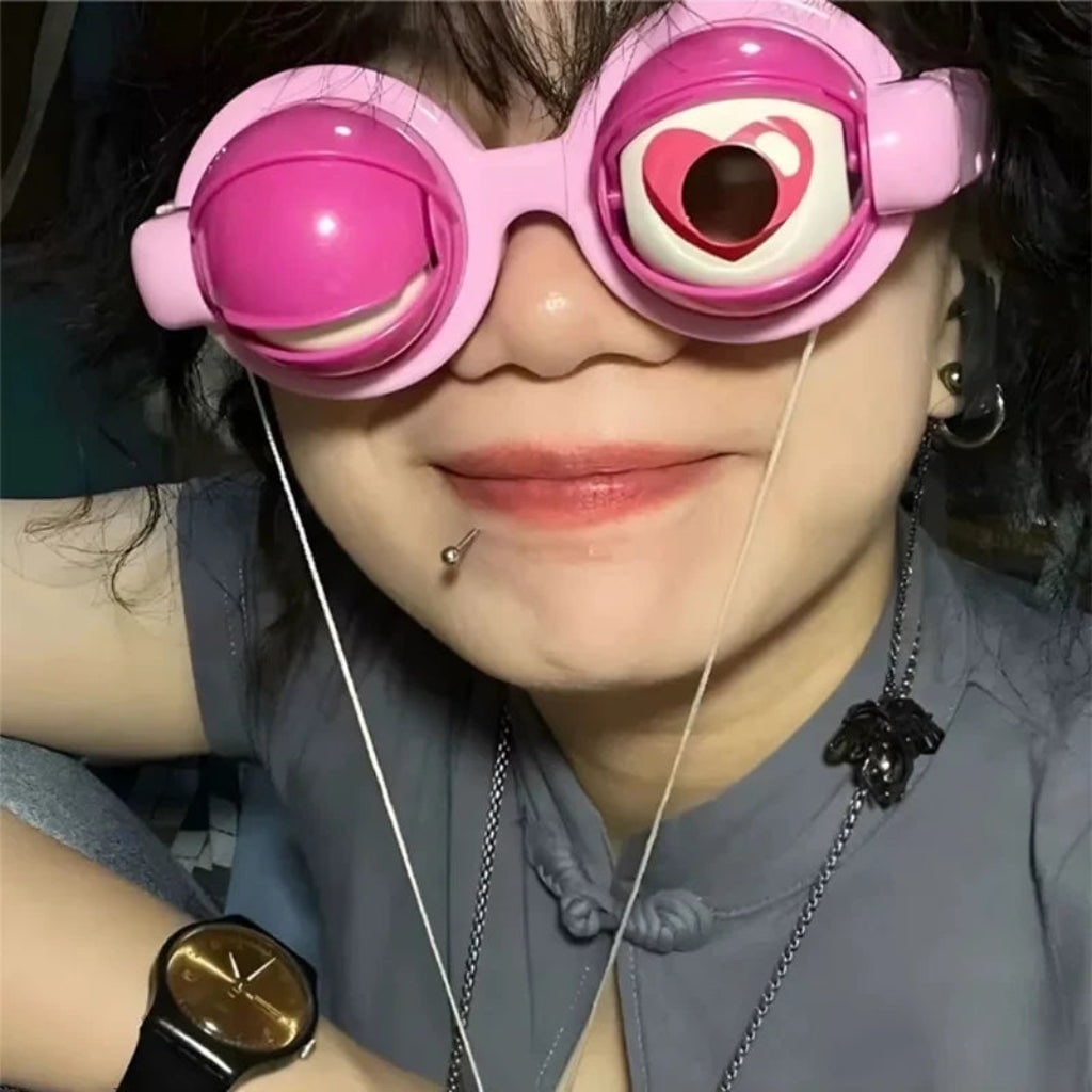 Lunettes fantaisie à yeux clignotants et commande par ficelle