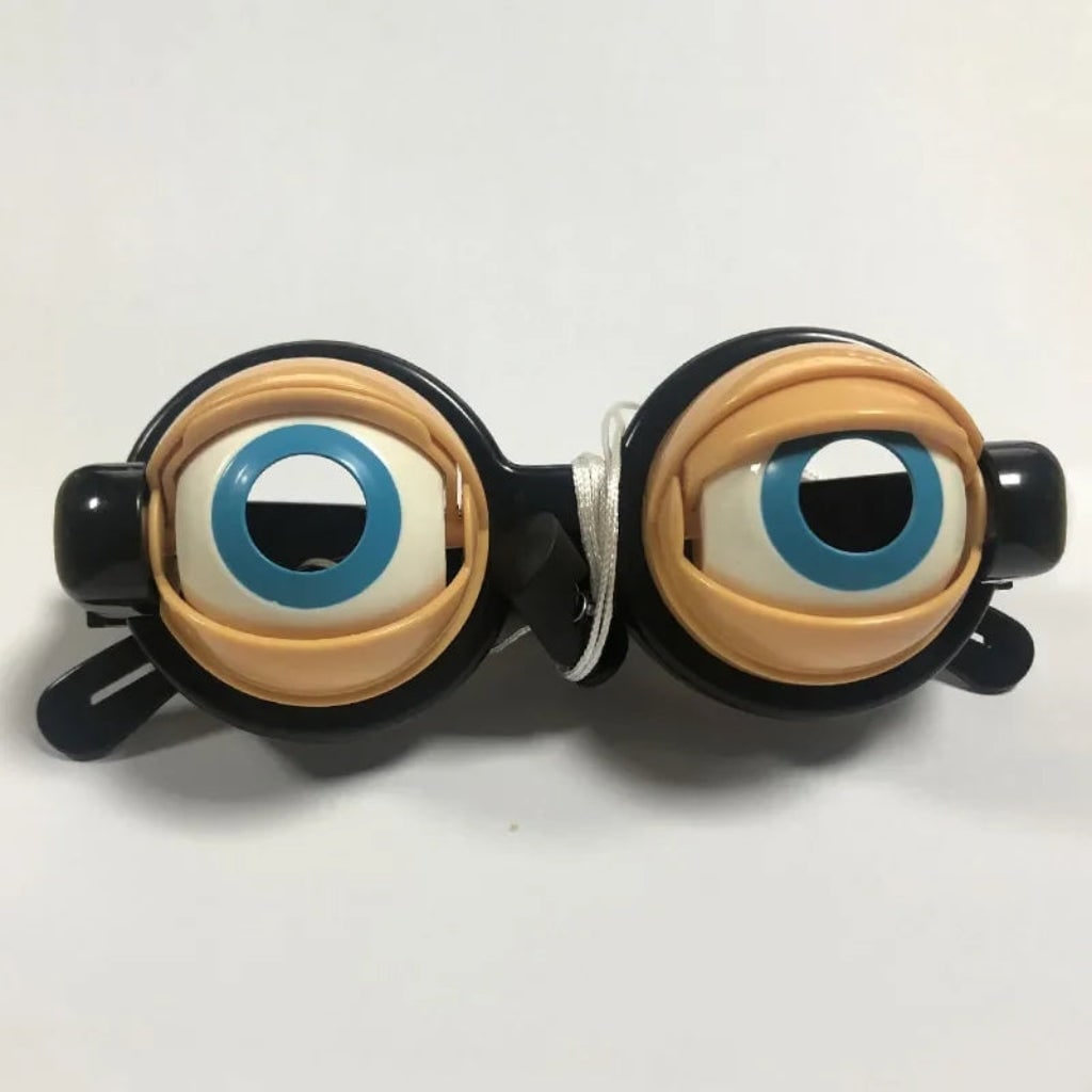 Lunettes fantaisie à yeux clignotants et commande par ficelle