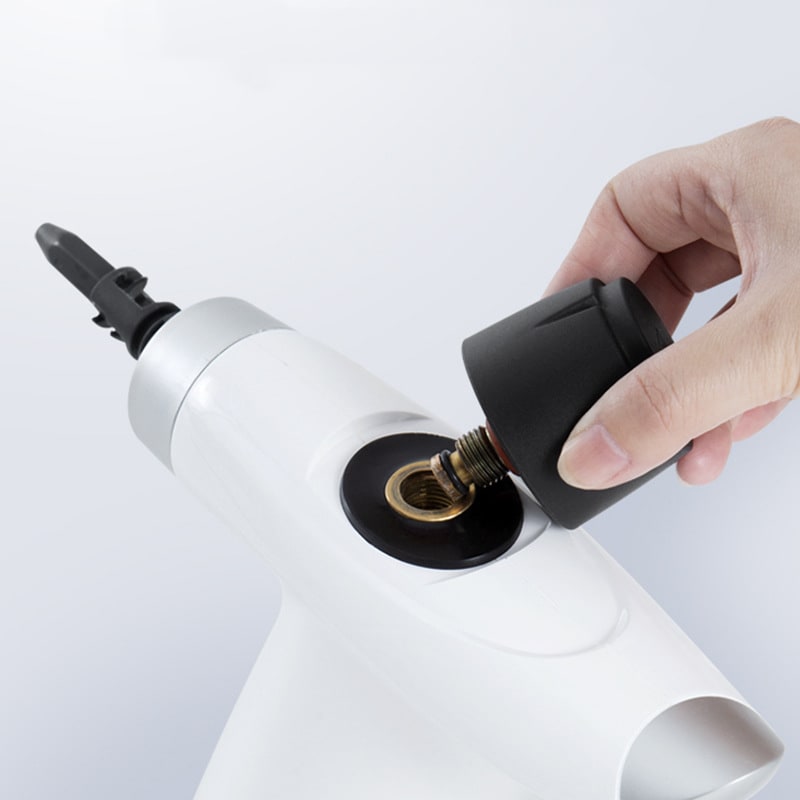 Nettoyeur vapeur portatif à réservoir de 300 ml et accessoires