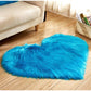 Tapis en forme de cœur en fausse fourrure avec base antidérapante