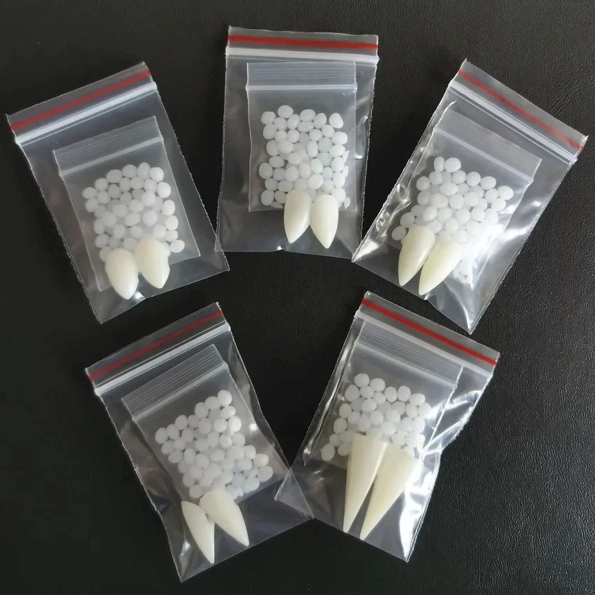 Dents de vampire en résine avec billes de fixation thermoplastiques