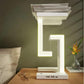 Lampe de table rechargeable à structure suspendue et base de recharge