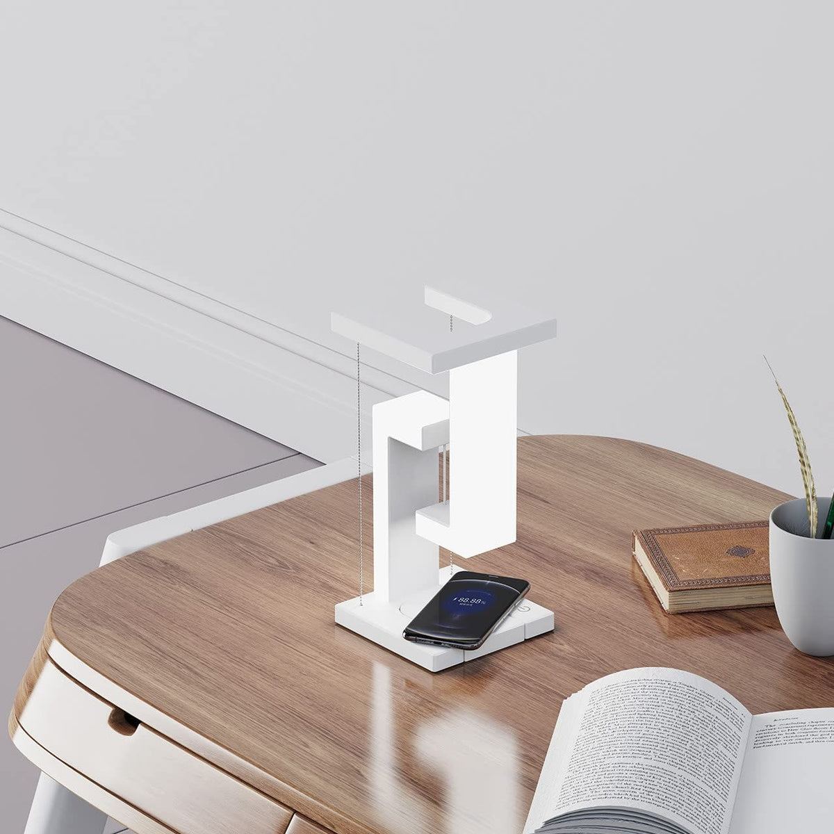 Lampe de table rechargeable à structure suspendue et base de recharge