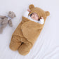 Couverture enveloppante bébé à capuche et jambes séparées