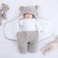 Couverture enveloppante bébé à capuche et jambes séparées