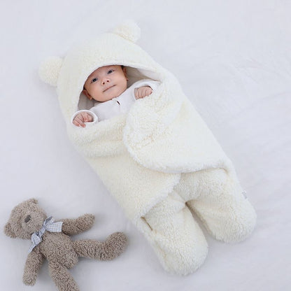 Couverture enveloppante bébé à capuche et jambes séparées