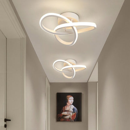 Plafonnier LED à anneaux géométriques superposés