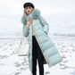 Manteau long matelassé à capuche en fausse fourrure et ceinture
