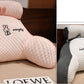 Dossier de lecture rembourré avec accoudoirs et coussin de nuque