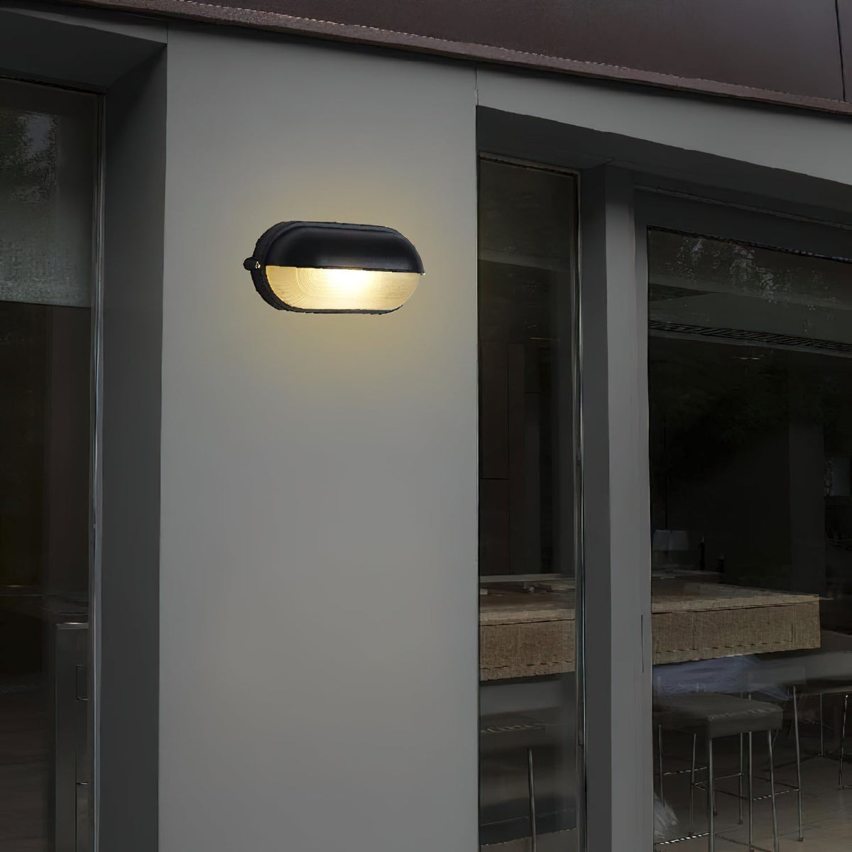 Applique extérieure ovale à diffuseur en verre rainuré