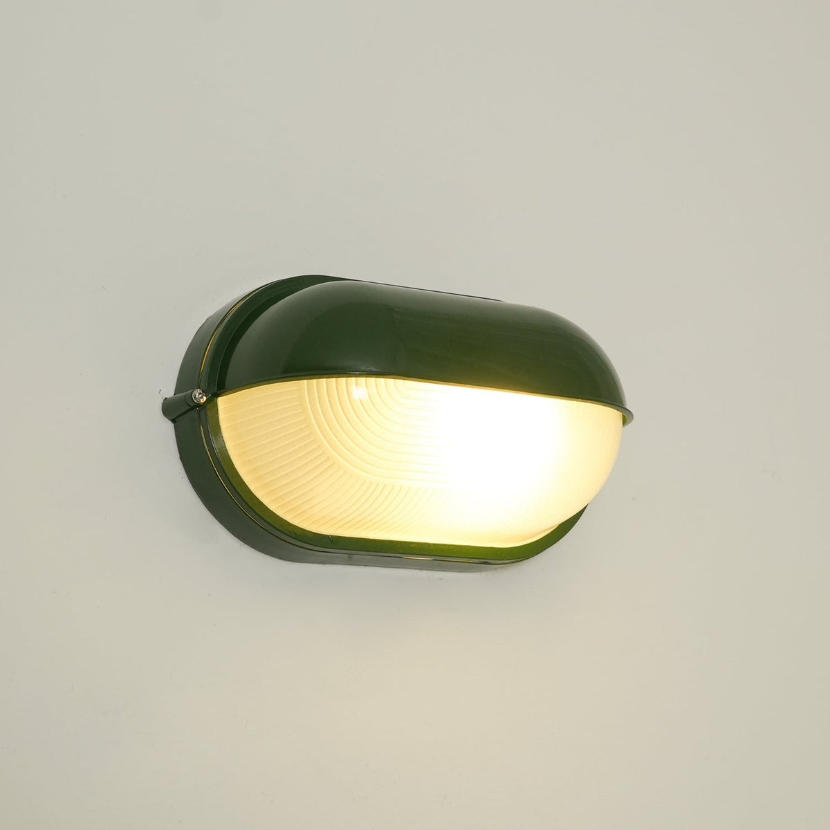 Applique extérieure ovale à diffuseur en verre rainuré