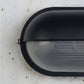 Applique extérieure ovale à diffuseur en verre rainuré