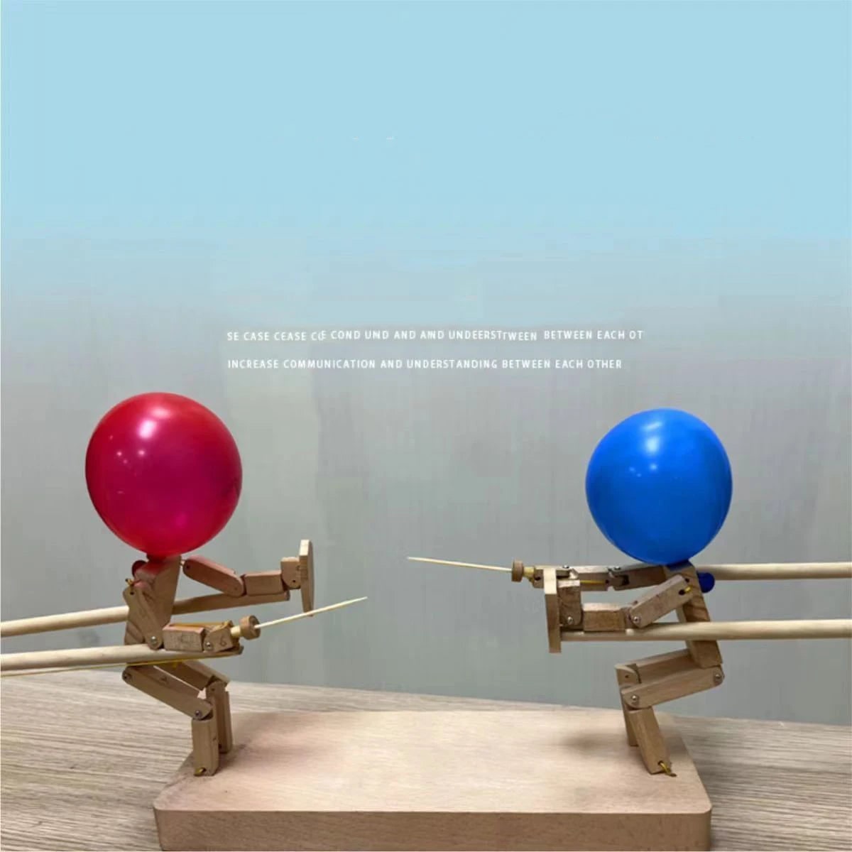 Jeu de duel en bois avec marionnettes et ballons