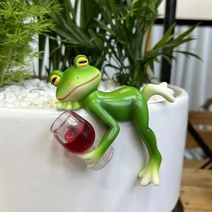 Figurine grenouille en résine à suspendre sur un pot