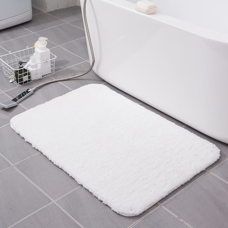 Tapis de bain à poils longs en microfibre avec envers antidérapant