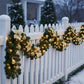 Guirlande de Noël lumineuse avec fleurs et ornements
