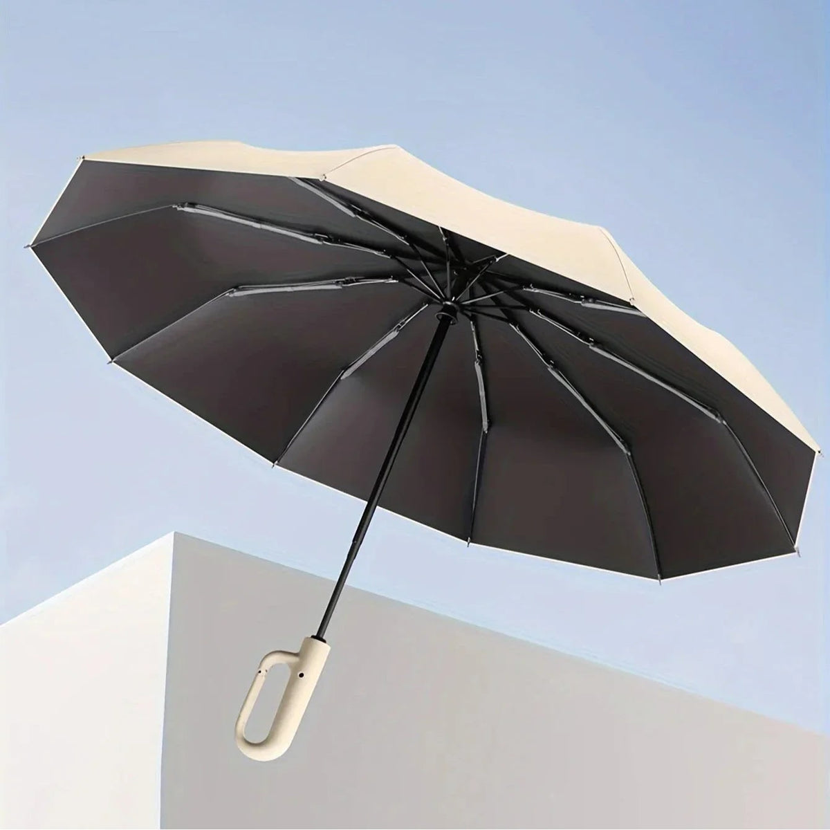 Parapluie de voyage compact avec attache mousqueton
