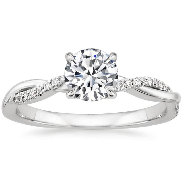 Bague solitaire à anneau torsadé et pierres décoratives